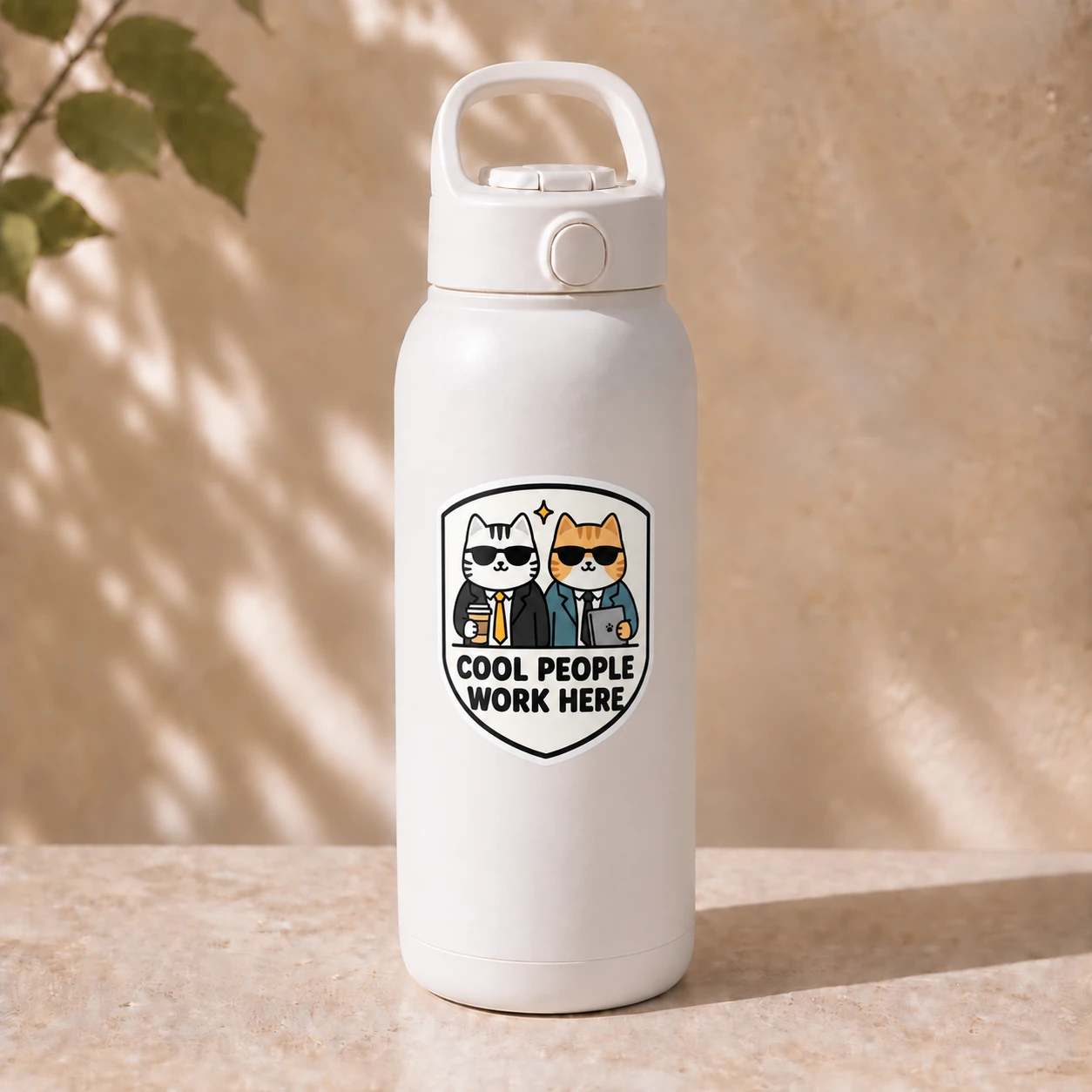 Cool People Work Here Sticker, Desk Duo design shown on a bottle