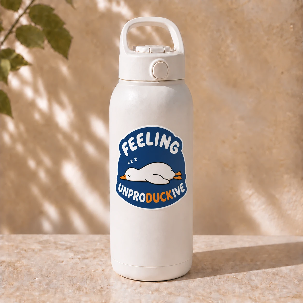Feeling Unproductive Duck Sticker, Navy Nap design shown on a bottle