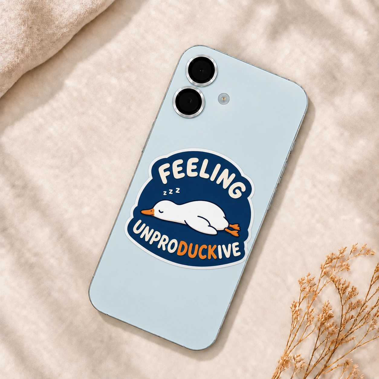 Feeling Unproductive Duck Sticker, Navy Nap design shown on a phone