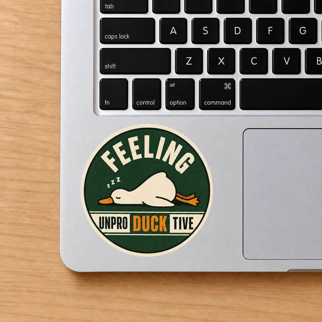 Feeling Unproductive Duck Sticker, Vintage Green design shown on a laptop palm rest