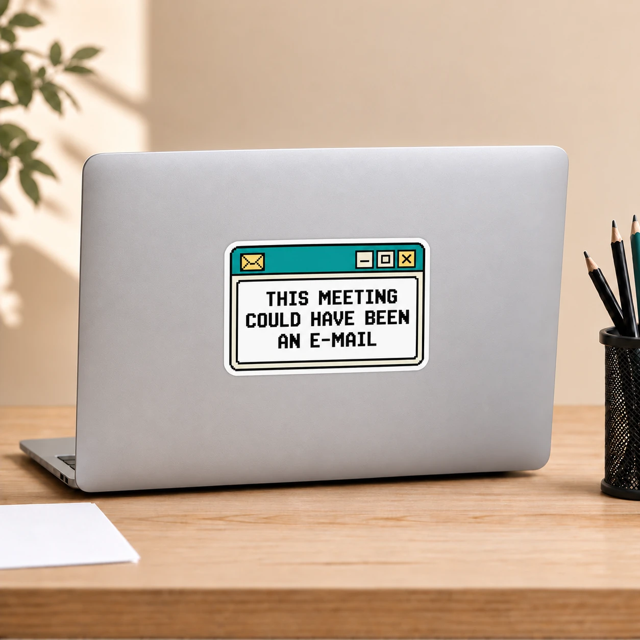 This Meeting Could Have Been an E-Mail Sticker, Retro Window design shown on a laptop lid