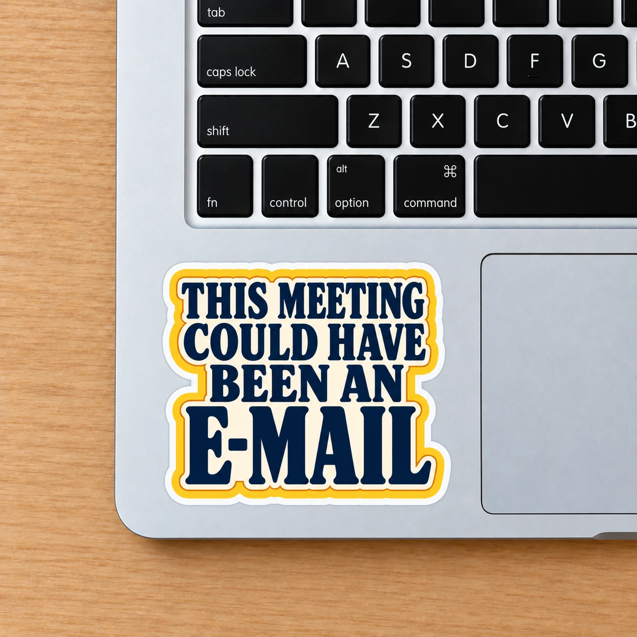 This Meeting Could Have Been an E-Mail Sticker, Bold Type design shown on a laptop palm rest