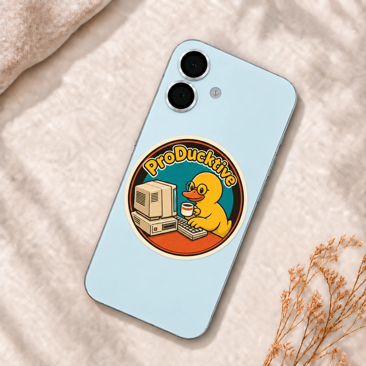 ProDucktive Sticker, Retro Badge design shown on a phone