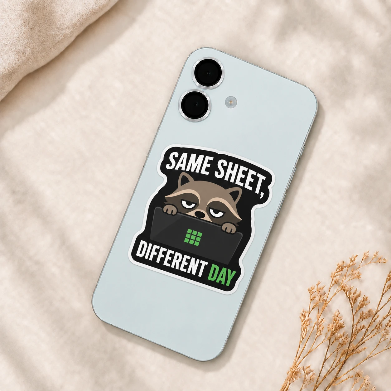 Same Sheet, Different Day Sticker, Laptop Peek design shown on a phone