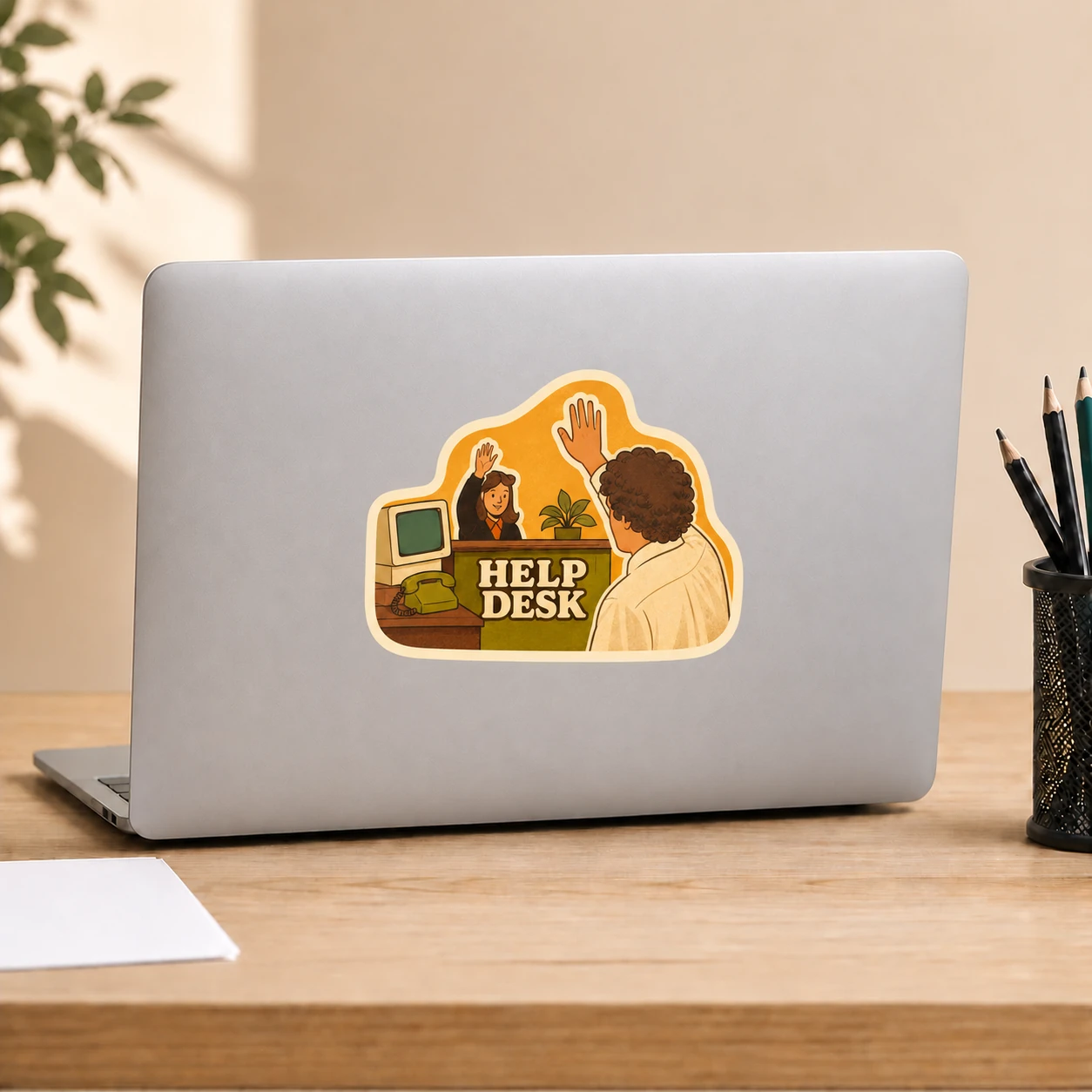 Help Desk Sticker, High Five design shown on a laptop lid