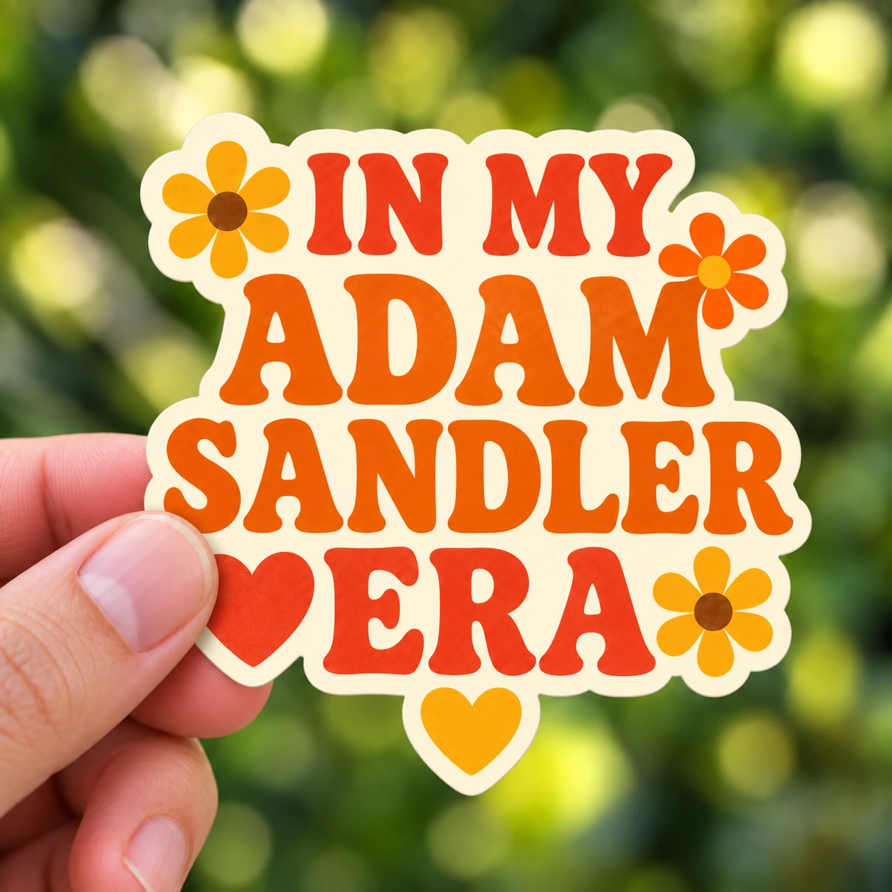 In My Adam Sandler Era Sticker, Retro Flowers design shown held in a hand