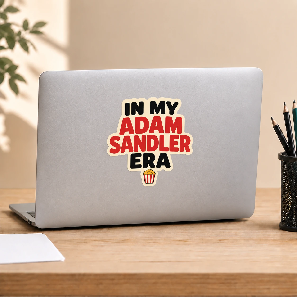 In My Adam Sandler Era Sticker, Movie Popcorn design shown on a laptop lid