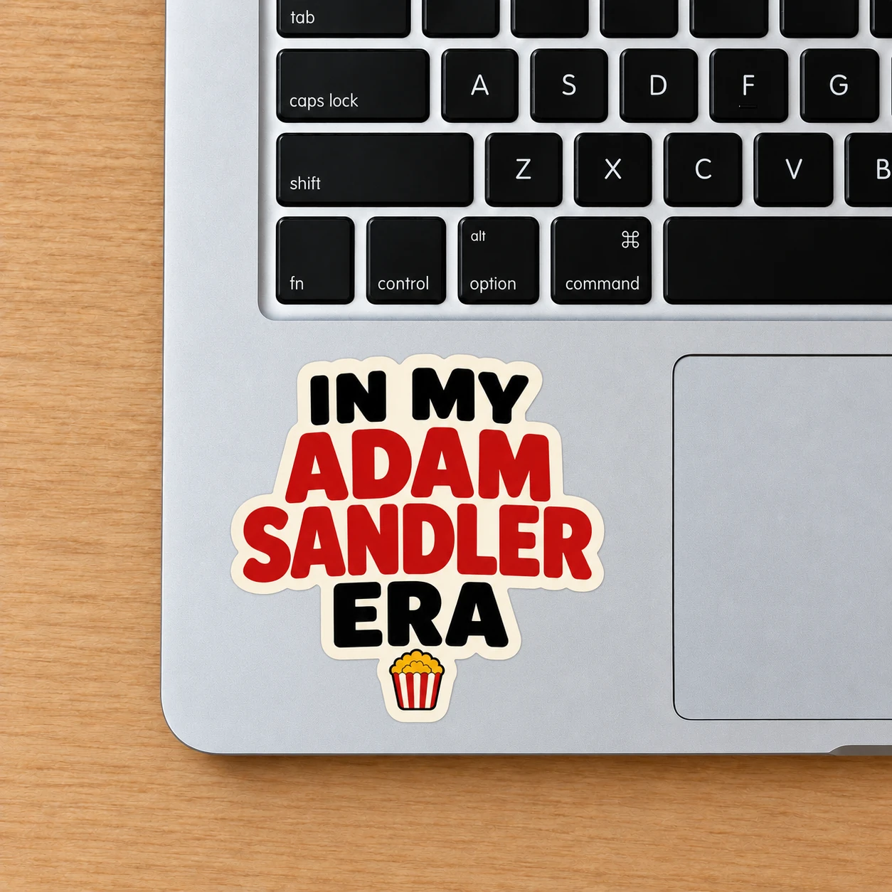 In My Adam Sandler Era Sticker, Movie Popcorn design shown on a laptop palm rest