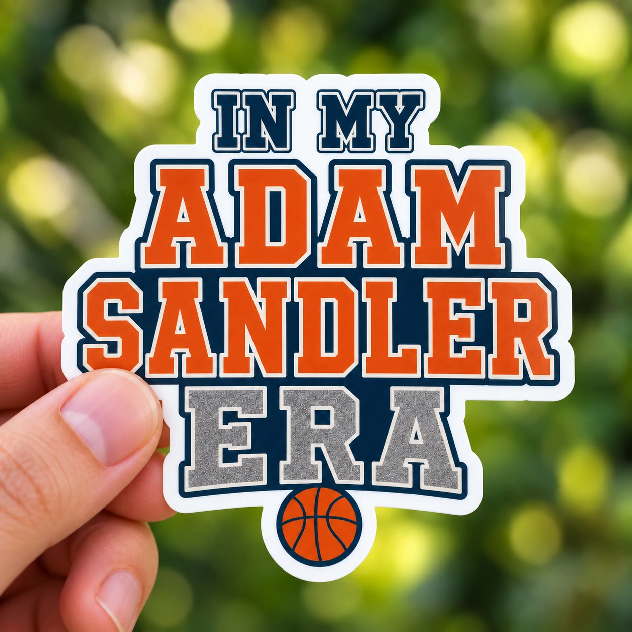 In My Adam Sandler Era Sticker, Varsity Basketball design shown held in a hand