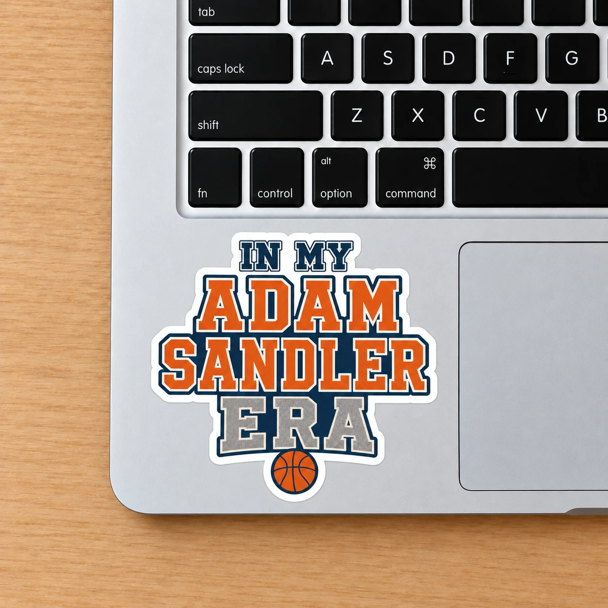 In My Adam Sandler Era Sticker, Varsity Basketball design shown on a laptop palm rest
