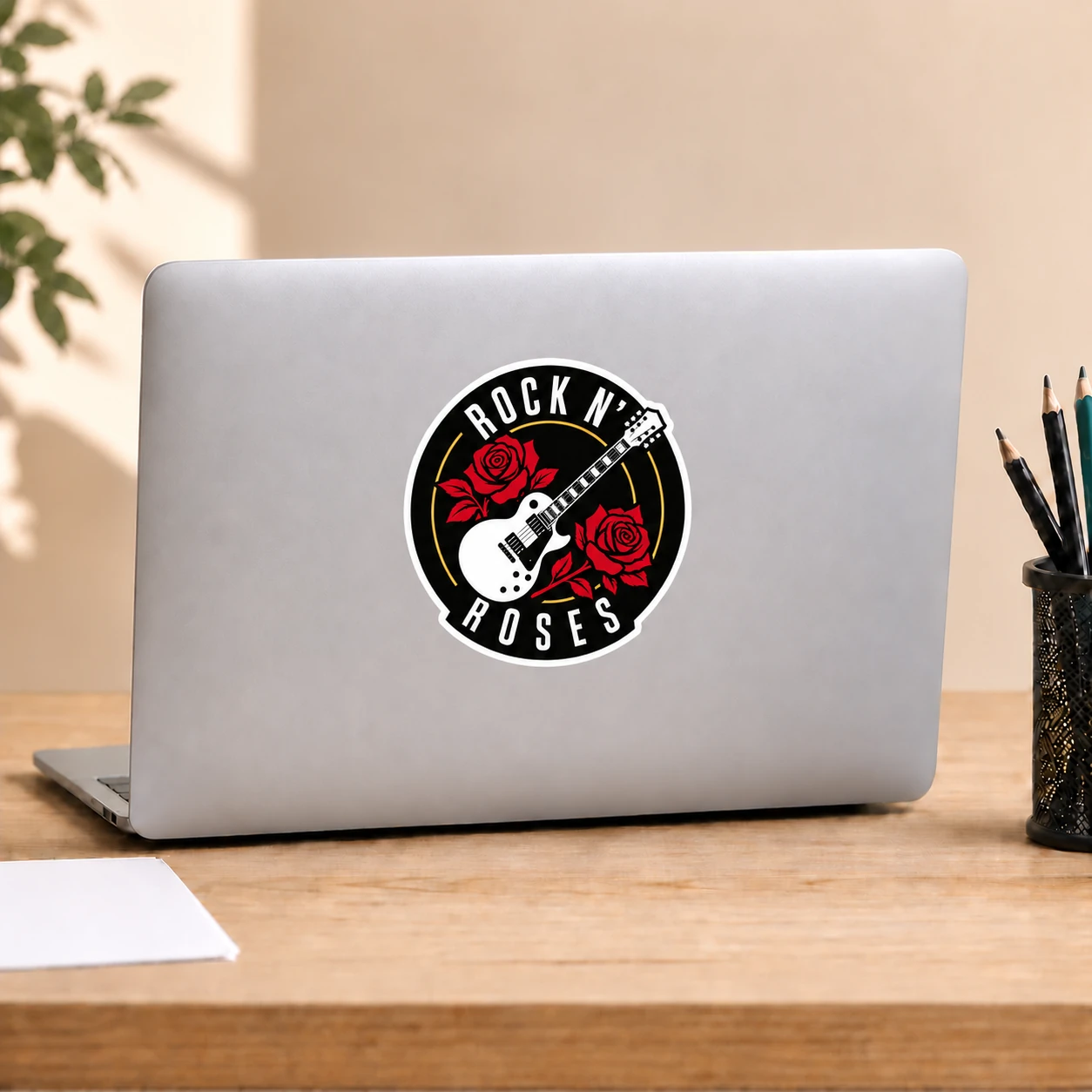 Rock ’n’ Roses Sticker, White Guitar design shown on a laptop lid