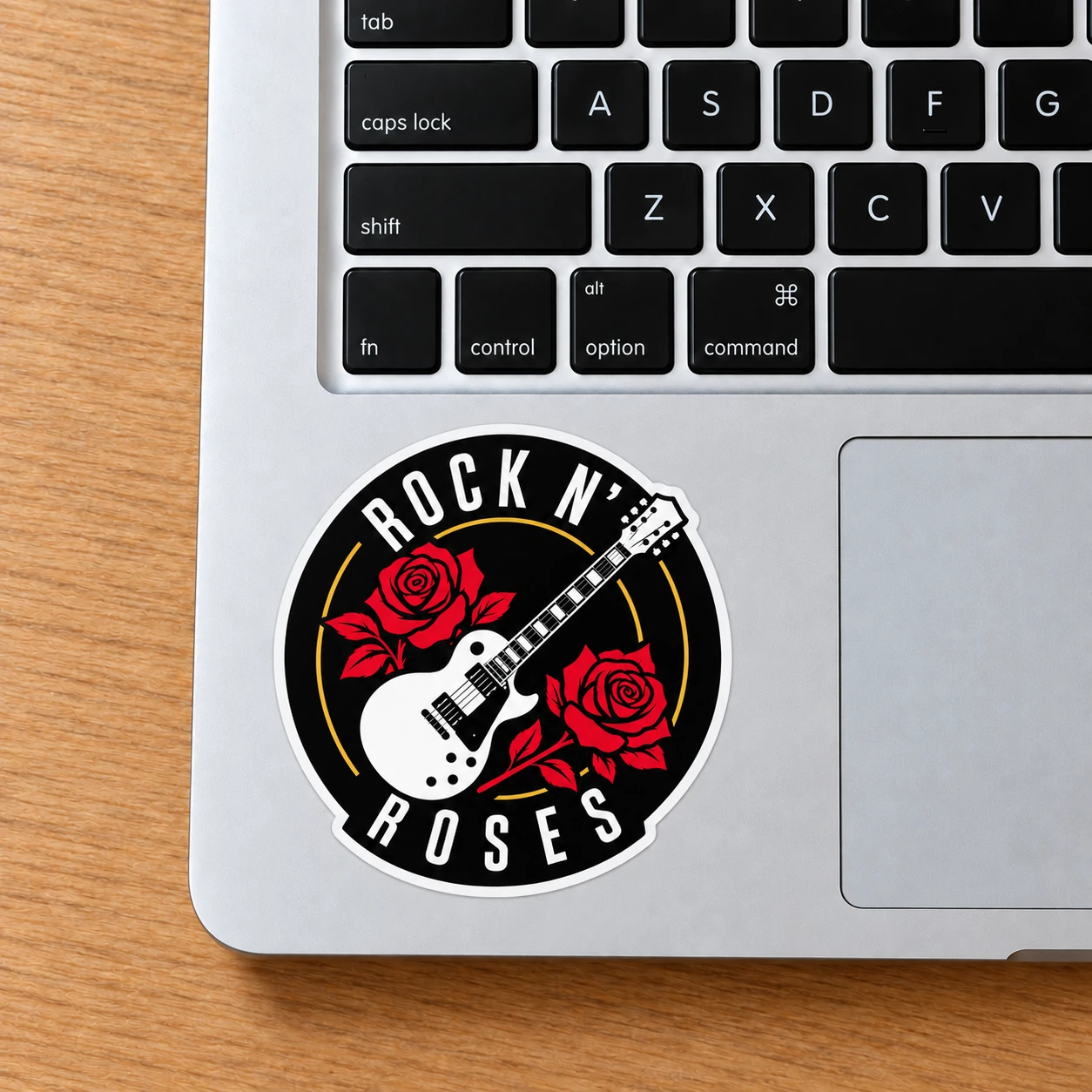 Rock ’n’ Roses Sticker, White Guitar design shown on a laptop palm rest