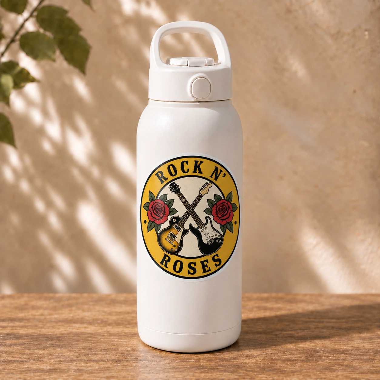 Rock ’n’ Roses Sticker, Crossed Guitars design shown on a bottle