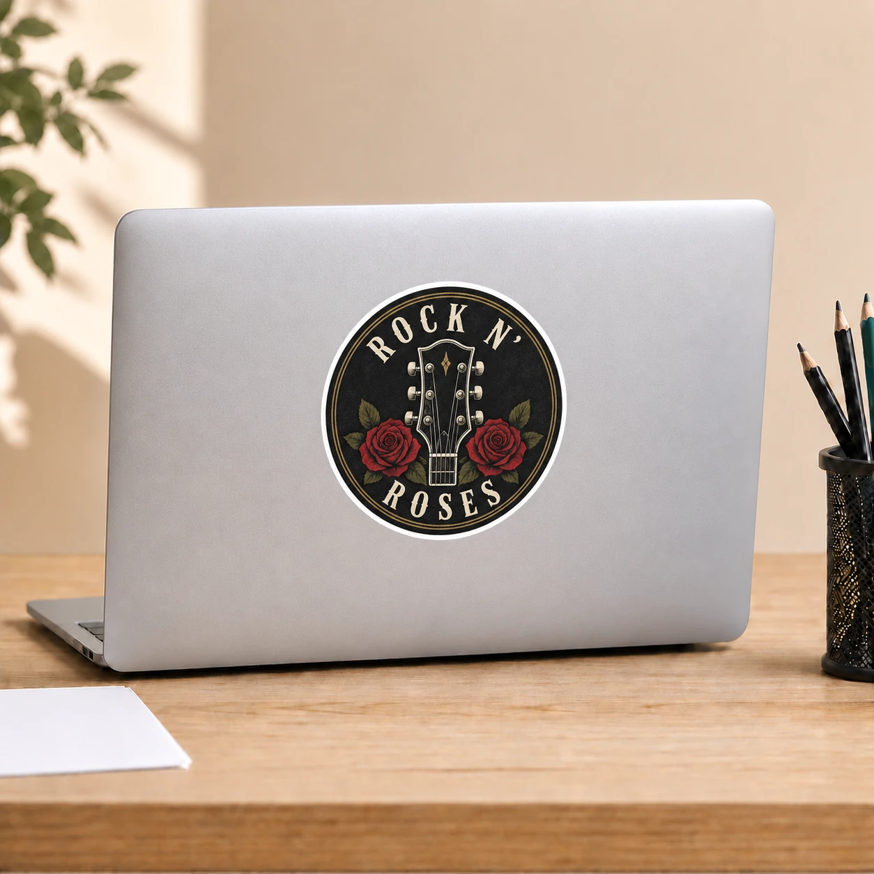 Rock ’n’ Roses Sticker, Rose Headstock design shown on a laptop lid
