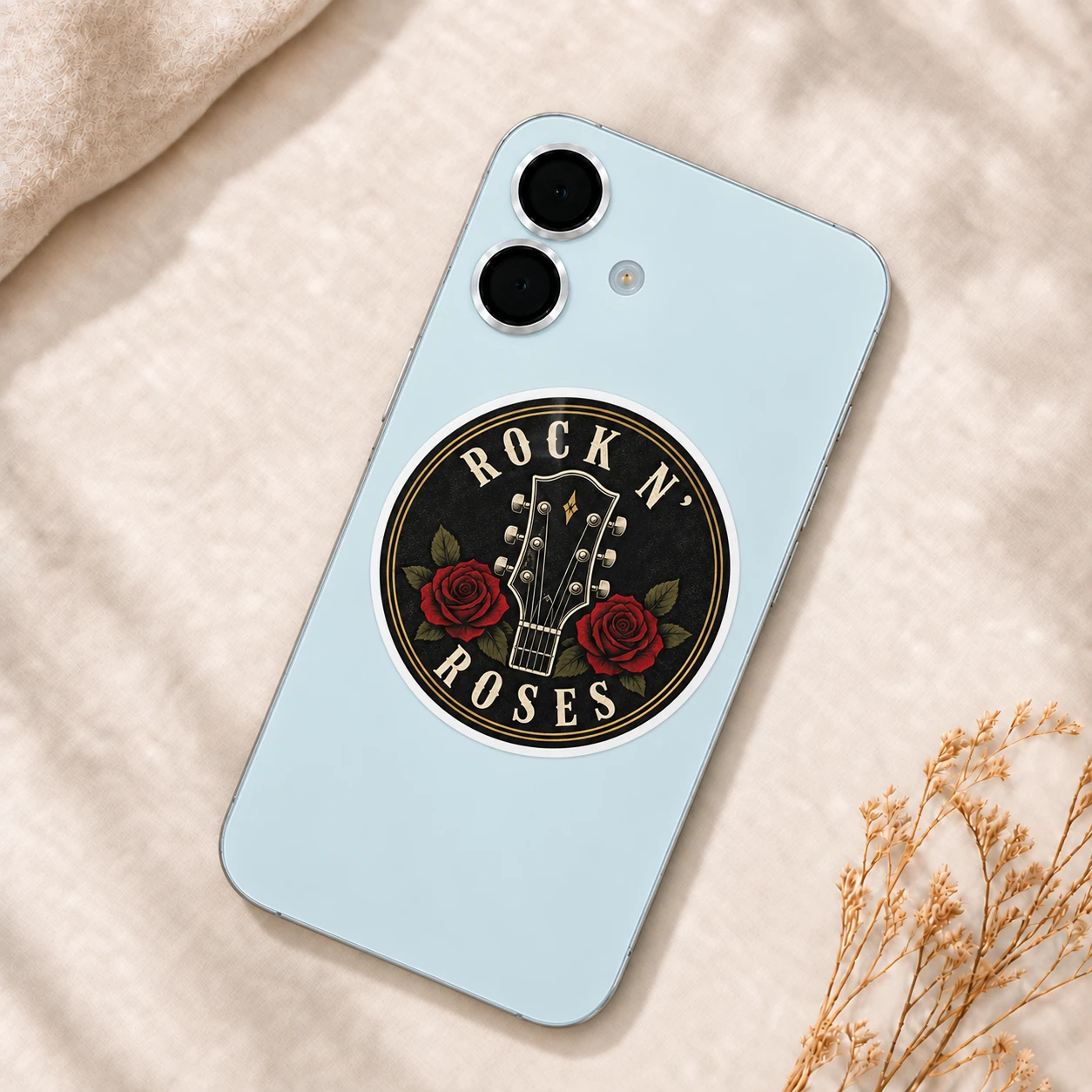 Rock ’n’ Roses Sticker, Rose Headstock design shown on a phone