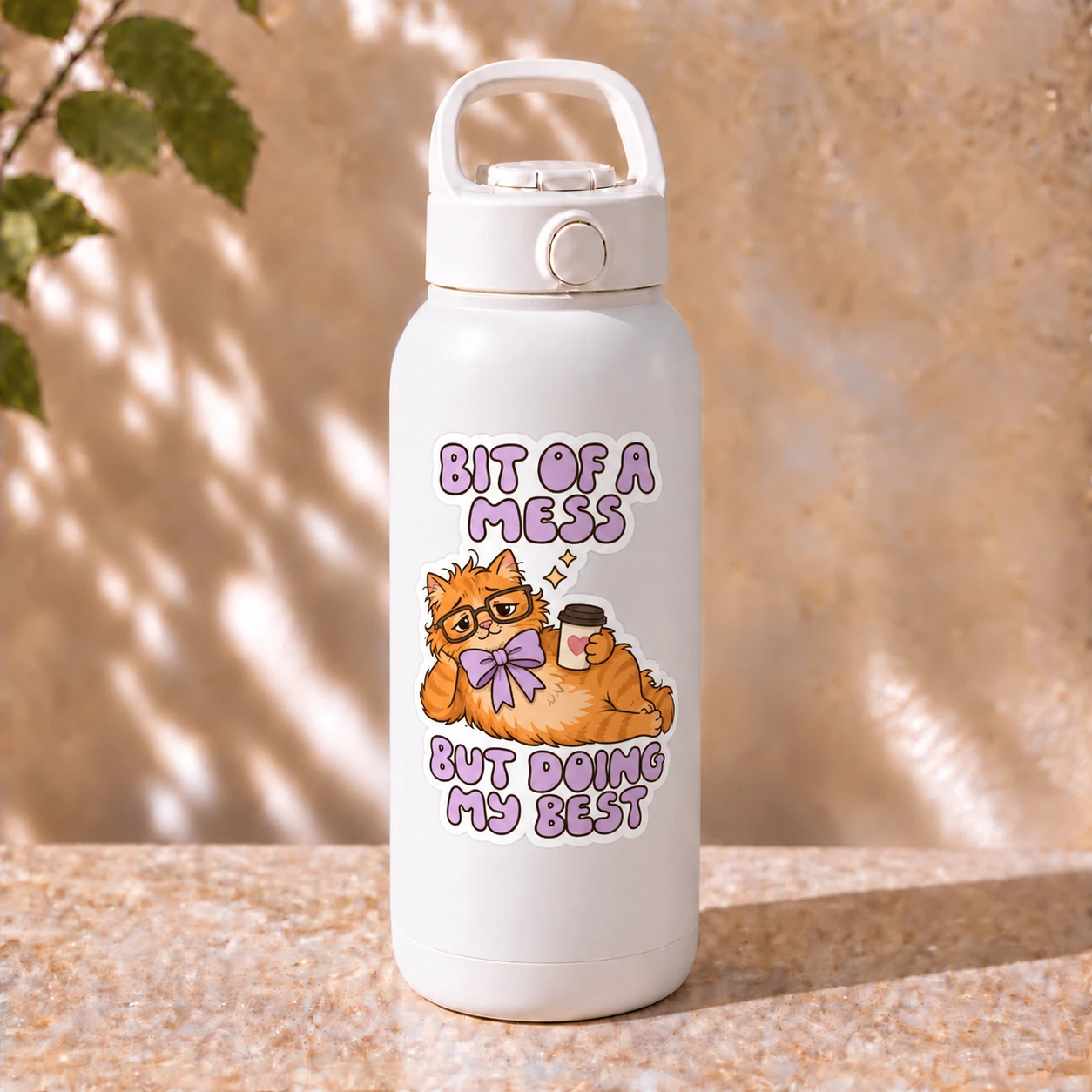 Bit of a Mess Sticker, Coffee Cat design shown on a bottle