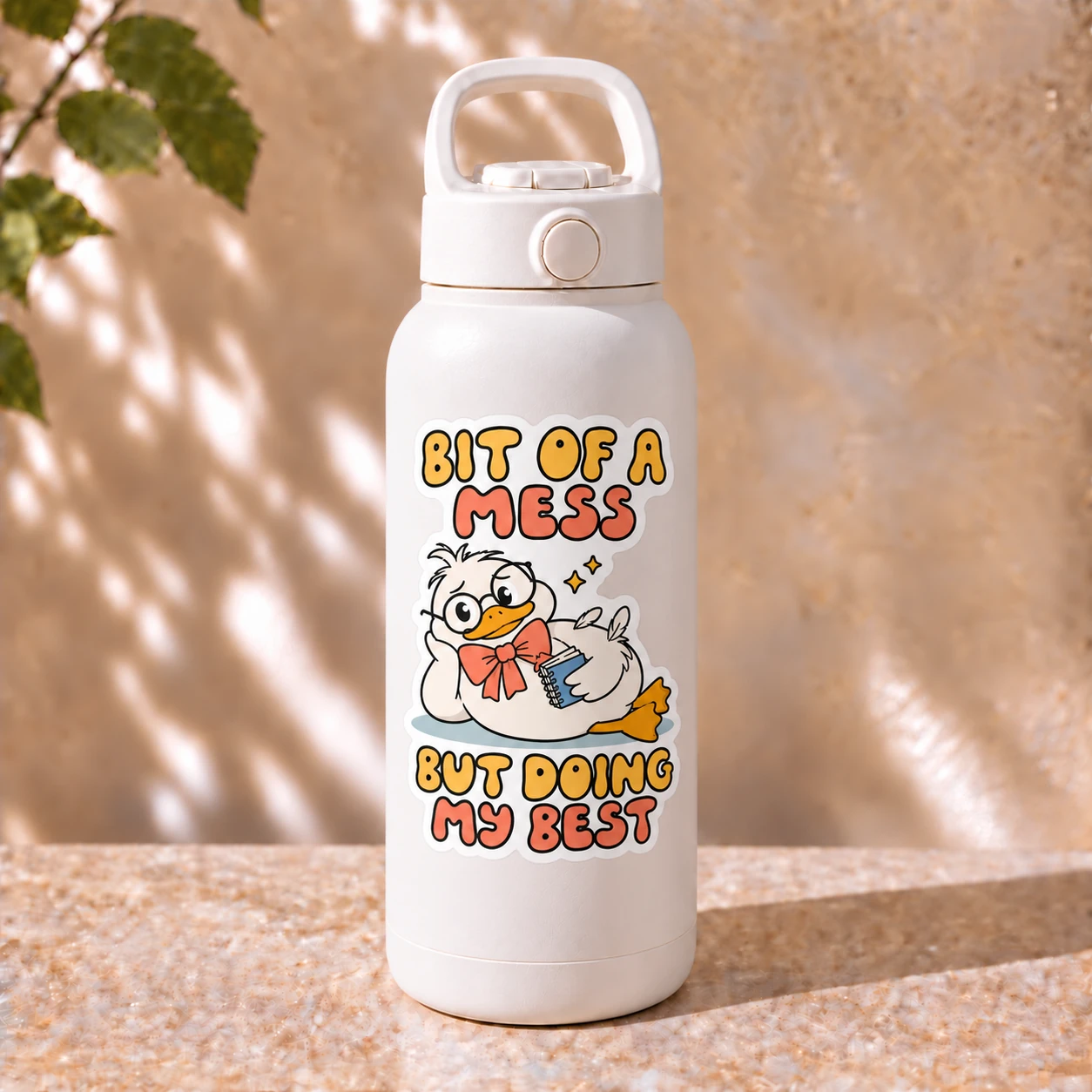 Bit of a Mess Sticker, Notebook Duck design shown on a bottle