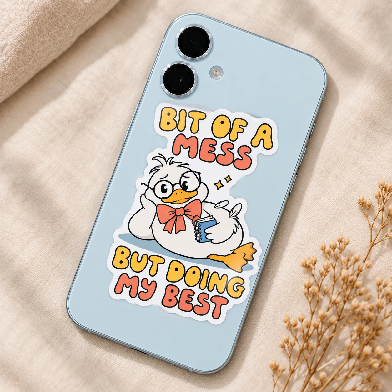 Bit of a Mess Sticker, Notebook Duck design shown on a phone
