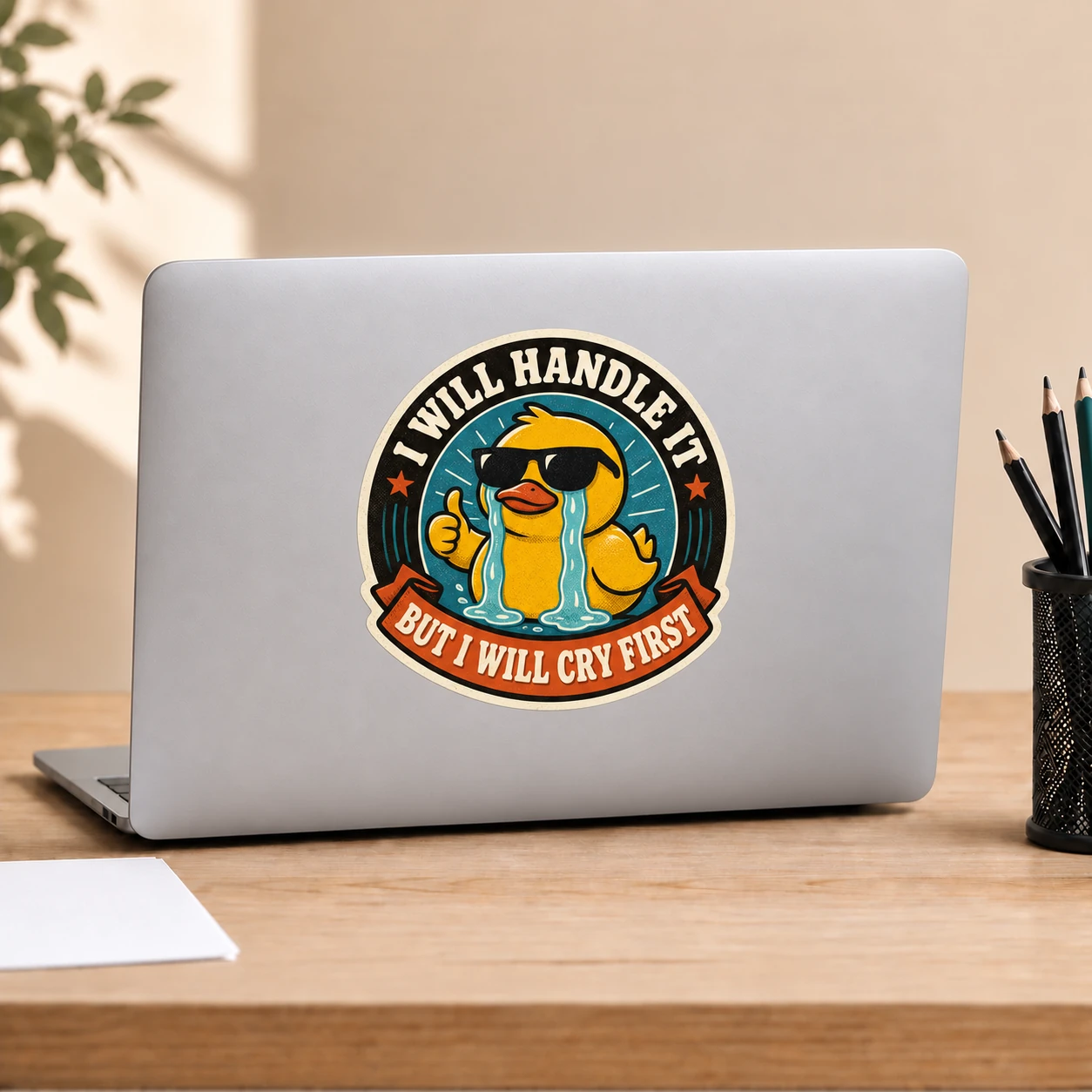 I Will Handle It, But I Will Cry First Sticker, Vintage Badge design shown on a laptop lid