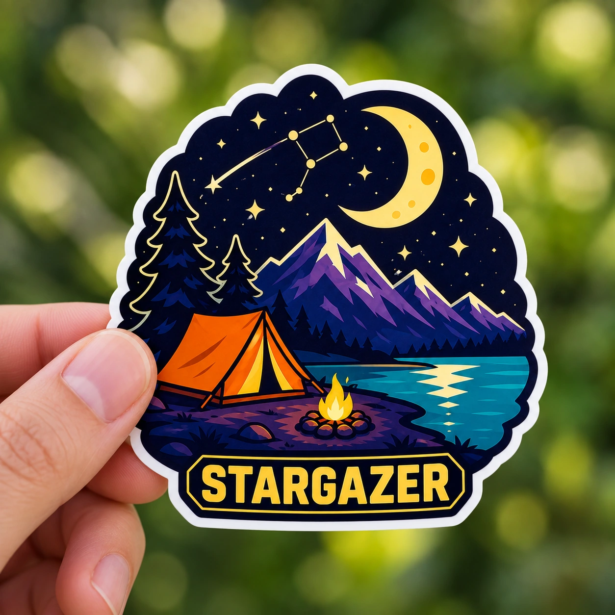 Starry Adventures Sticker, Stargazer design shown held in a hand