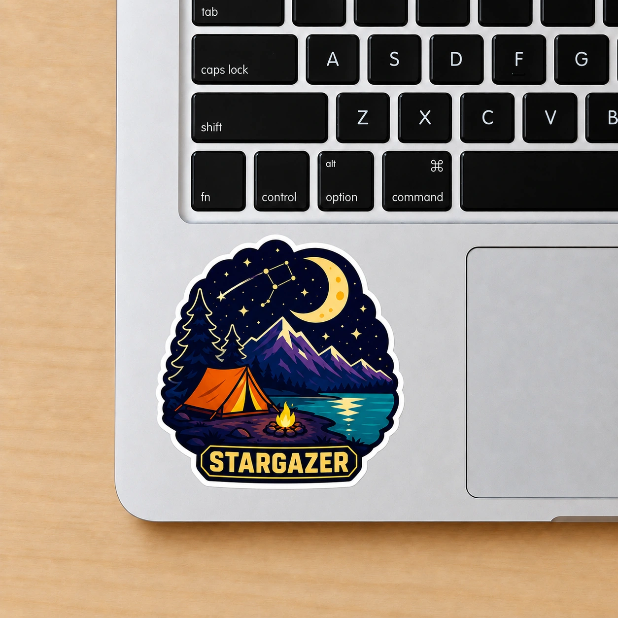 Starry Adventures Sticker, Stargazer design shown on a laptop palm rest
