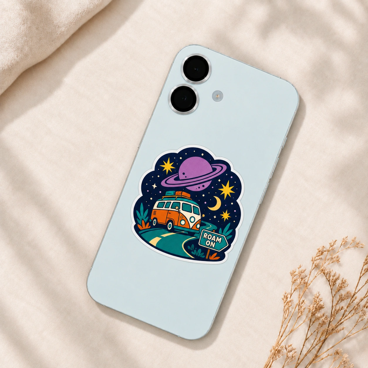 Starry Adventures Sticker, Roam On design shown on a phone