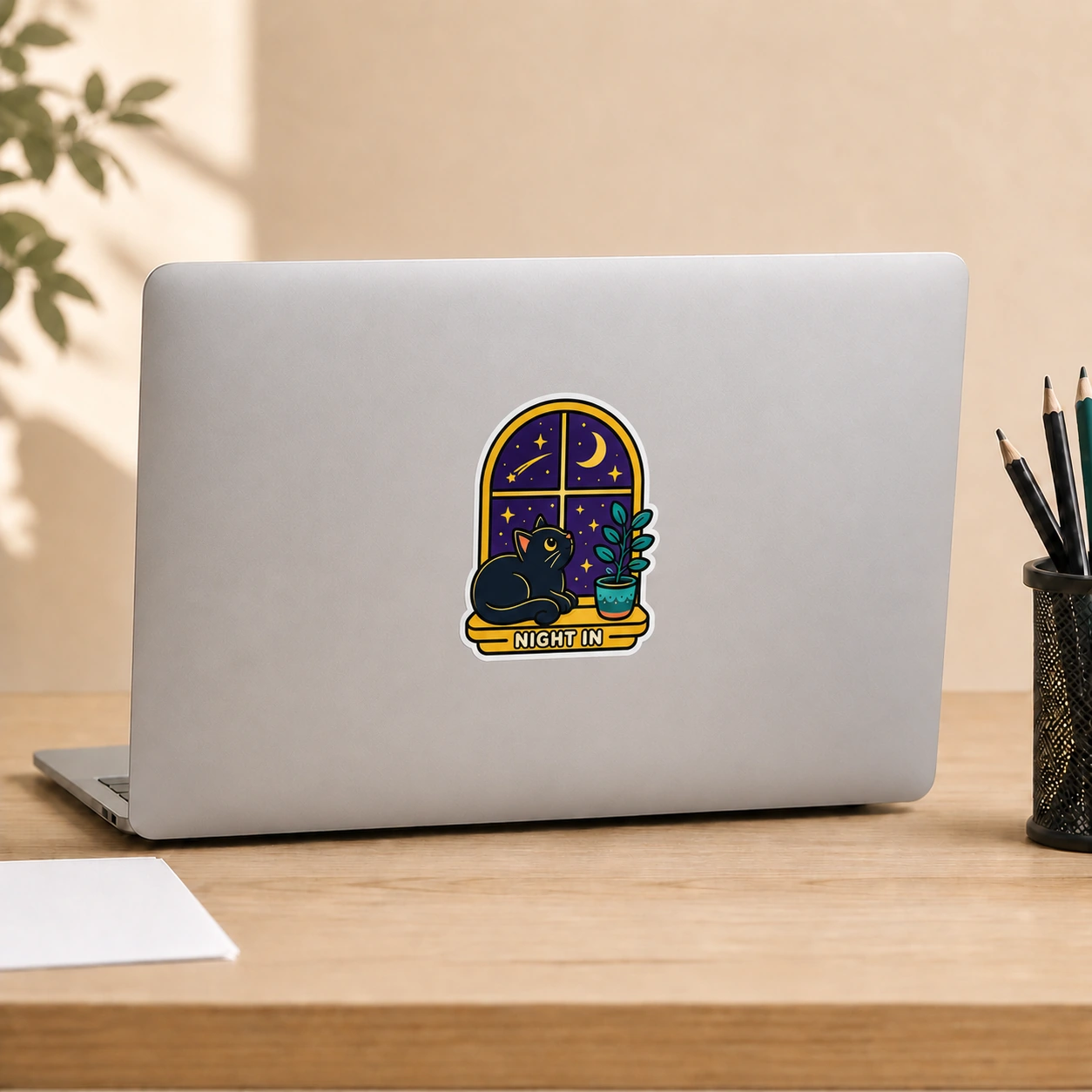 Starry Adventures Sticker, Night In design shown on a laptop lid